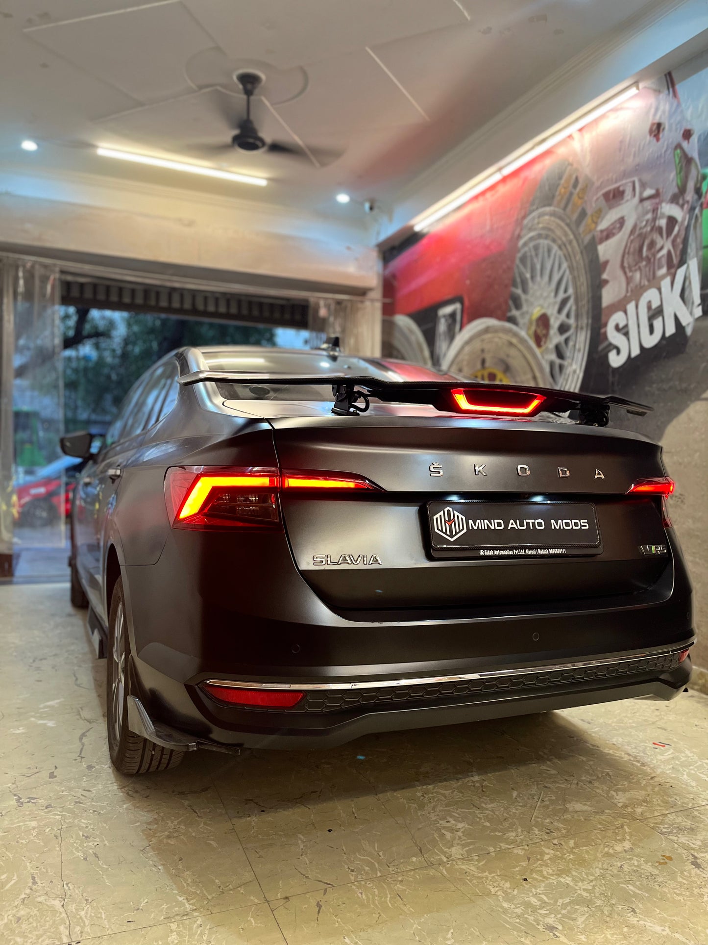 UNIVERSAL REMOTE CONTROLLED AUTOMATIC SPOILER