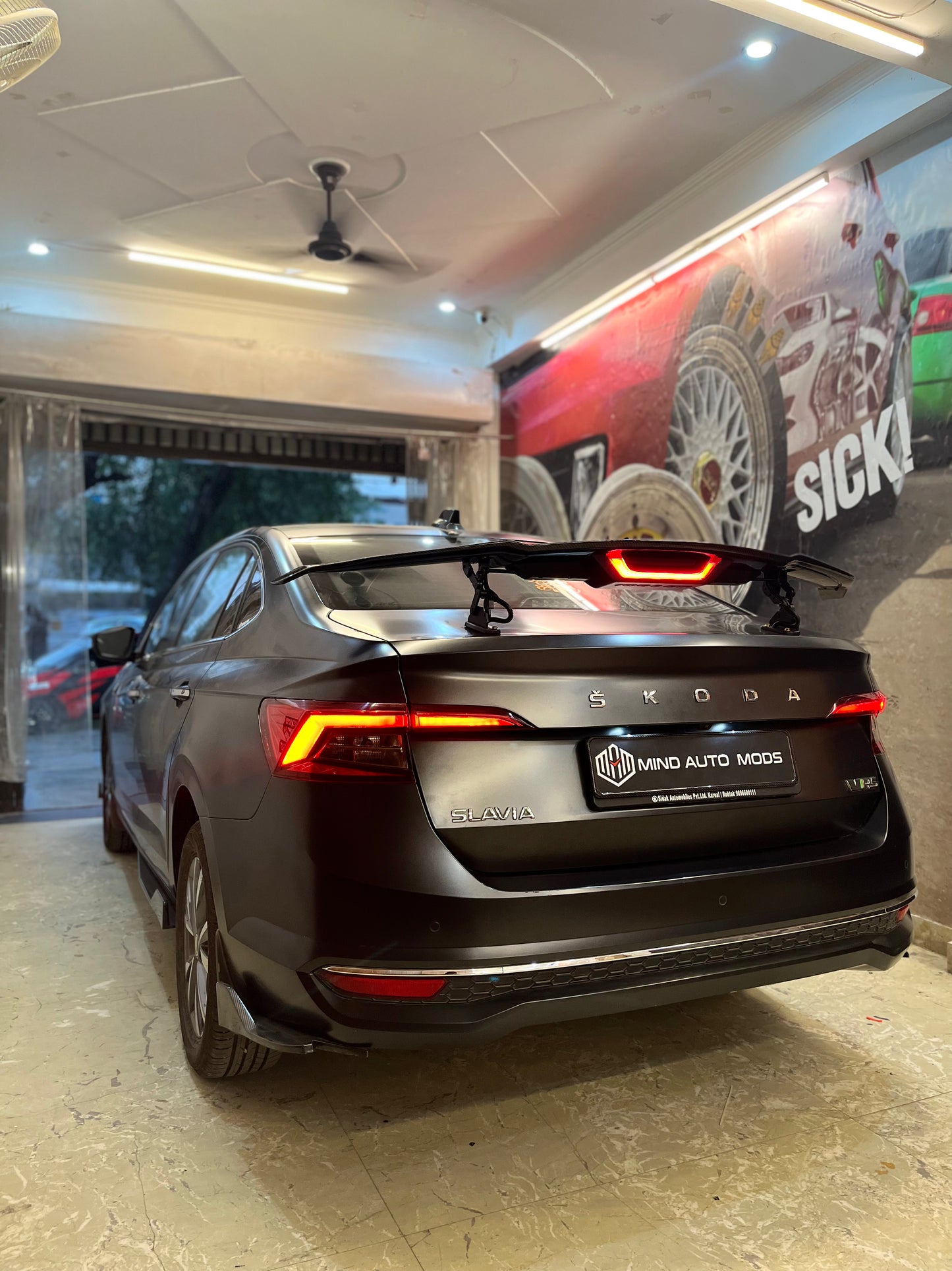 UNIVERSAL REMOTE CONTROLLED AUTOMATIC SPOILER