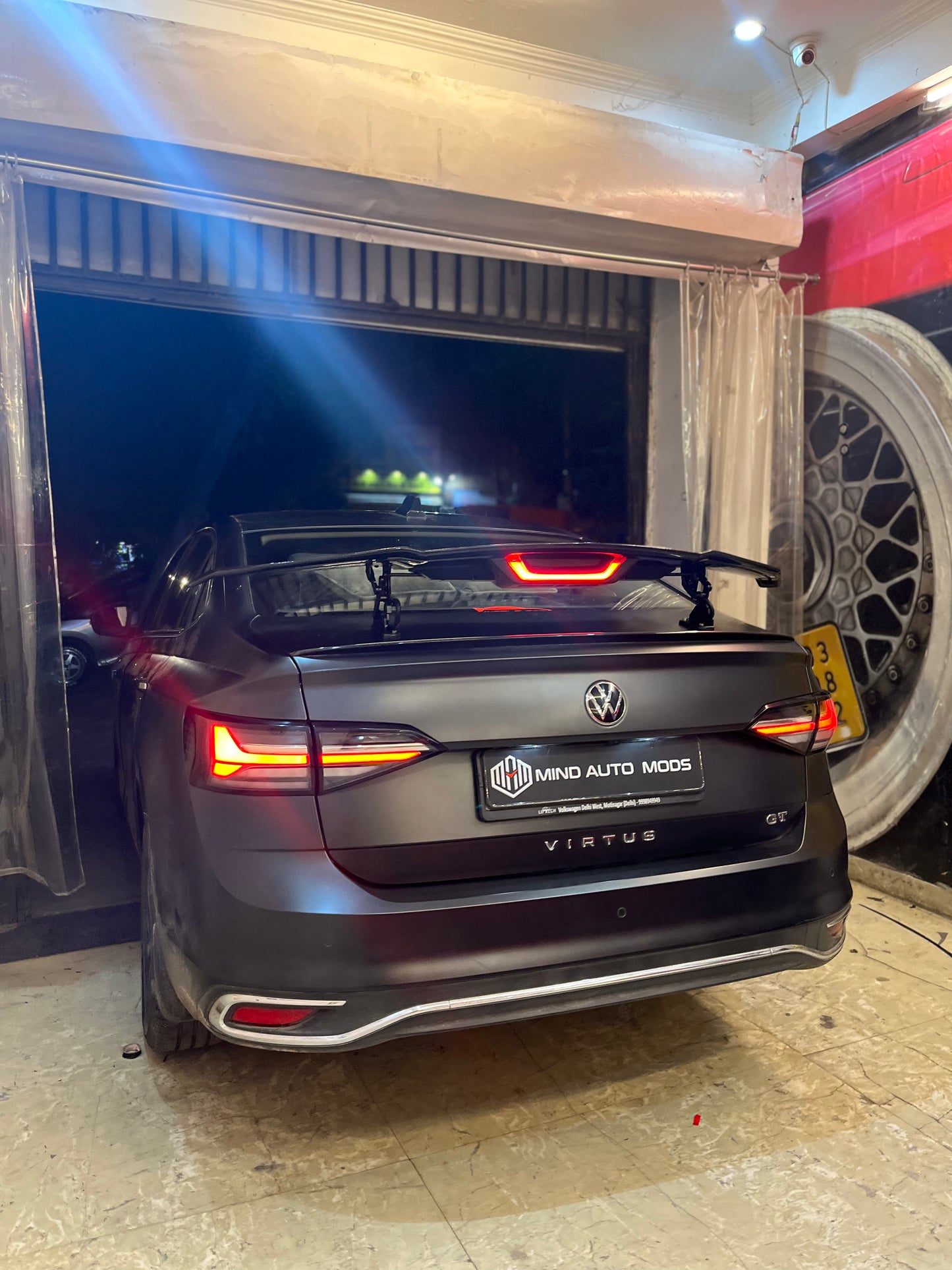 UNIVERSAL REMOTE CONTROLLED AUTOMATIC SPOILER