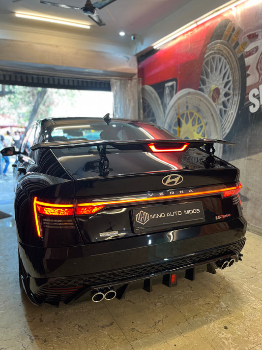 UNIVERSAL REMOTE CONTROLLED AUTOMATIC SPOILER